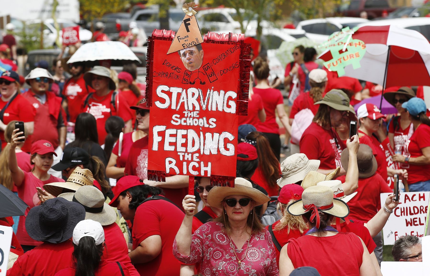 "Starving the schools feeding the rich"